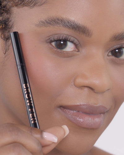 Applying Brow Pen in Chocolate